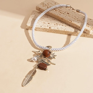 Bohemian woven rope necklace with gold feather pendant, wood beads and faux pearls