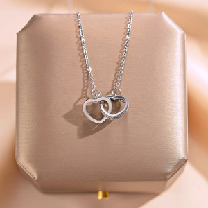 Elegant 18k gold plated stainless steel necklace with interlocking pavé diamond double hearts