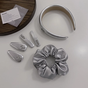 Silver PU leather y2k hair accessory set with headband, clips, and scrunchie detail