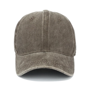 Detail of vintage washed dark brown cotton baseball cap fabric texture and stitching