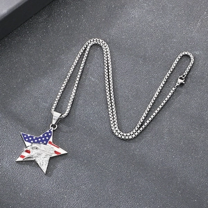 Detailed close-up of eagle star pendant with American flag pattern on box chain