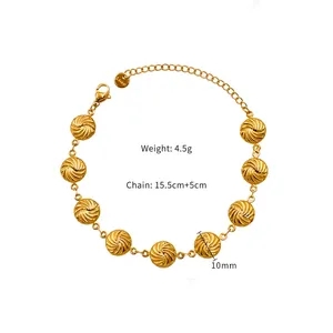 Detailed view of gold spiral disc bracelet with S.Steel lobster clasp and extender