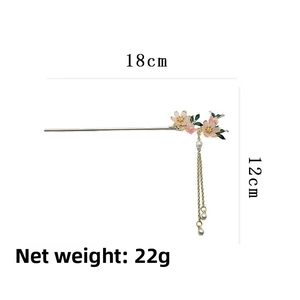Chinese hair pin details showing 18cm length and 12cm tassels with flower decoration