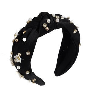 Retro black knot headband with pearls and flowers, wide brim style for elegant hair styling