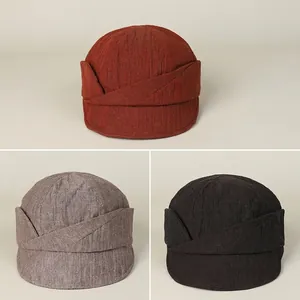 Japanese linen newsboy cap in orange, grey and dark coffee with vintage textures