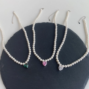 Elegant S925 sterling silver pearl necklace featuring colorful heart shaped crystal pendants