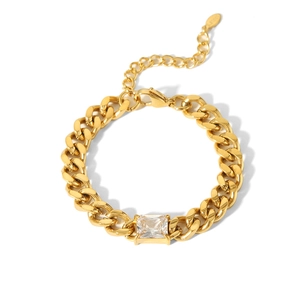 Detail of 18K gold plated Cuban chain bracelet with a square zircon and lobster clasp