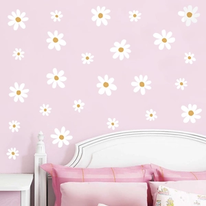 White daisy wall decals in various sizes for cozy bedroom and nursery wall decoration