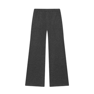 Detailed close-up of dark grey high-waisted wide-leg trousers in soft knitted fabric