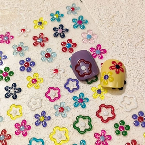 3D floral nail art stickers with embossed colorful flowers and gold line details