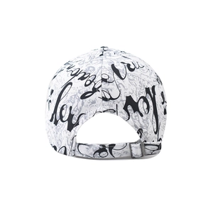 Detail of white cotton baseball cap with black graffiti print and adjustable metal buckle