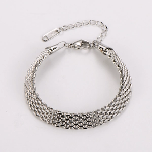 Detail of silver multi-layer woven chain bracelet with 18KGPL tag and adjustable clasp