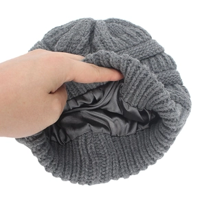 Solid grey knitted beanie hat with smooth anti-static satin lining for wind protection