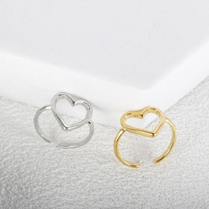 Minimalist open heart ring with textured hammer finish and adjustable geometric band