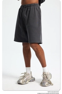 Detailed texture of dark grey 420g washed cotton shorts with elastic drawstring waist