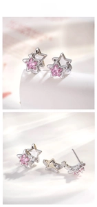 Detailed view of pink star zircon earrings with silver metal base and secure clasp