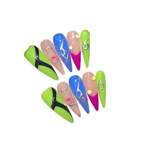 Handmade Y2K cyberpunk stiletto press-on nails with blue green metal line art