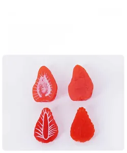 Detailed macro view of realistic strawberry fruit slice model for DIY miniature crafts