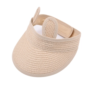 Detail of beige straw open-top sun hat featuring cute woven bunny ears for kids