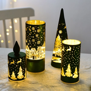 Set of 4 dark green Christmas candle holders with snowflake and reindeer cutouts