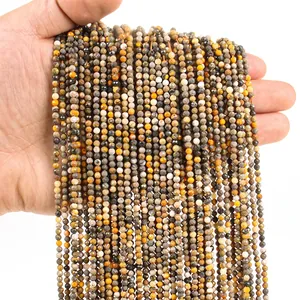 Macro view of 3mm faceted natural stone beads in earthy tones for DIY jewelry making