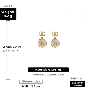 Detailed view of retro shell earrings with size specs and 925 silver needle material
