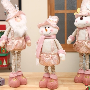 Pink and gold telescopic Christmas plush figurines set featuring Santa, Snowman and Reindeer