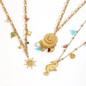 Golden stainless steel seashell and seahorse charm necklaces for beach vacations