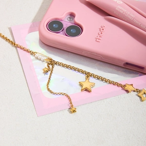 Collana in acciaio inossidabile placcato oro 18k con ciondoli stella e perla su carta