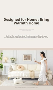 Detailed texture of cream-colored quilted cotton sofa cover with plush cushions