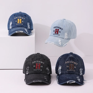 Kids vintage distressed denim baseball caps with retro embroidery and frayed edges