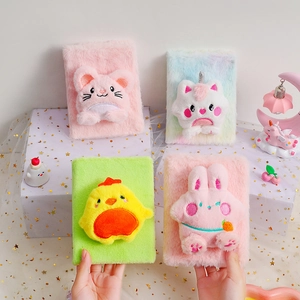 Close-up of four colorful plush notebooks with 3D cartoon animal characters and soft fur