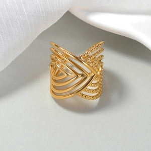 Interwoven V-shape wide ring with 18K gold plating and beaded texture on light background