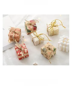 Detail of diverse Christmas gift boxes with festive patterns and decorative ribbons