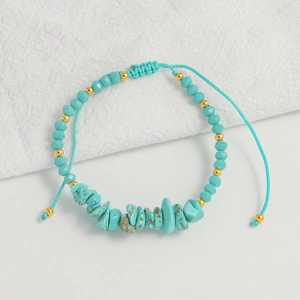 Detail of bohemian turquoise beads and handmade braided adjustable sliding knot closure