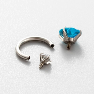Titanium steel horseshoe ring ear piercing with blue and clear sparkling heart stones