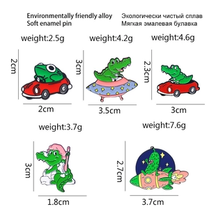 Cartoon animal pins set featuring crocodile in spaceship and frog driving car for bags