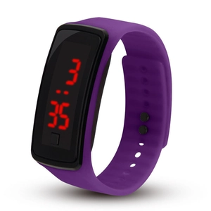 Detail of purple silicone LED digital watch with red digits display and dual button closure