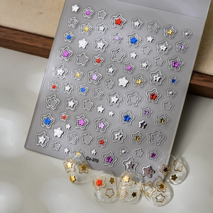Detail of 5D gold and silver star nail stickers showing Co-370 metallic star patterns