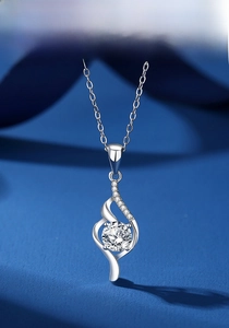 Detail of S925 silver necklace with 1-carat moissanite in dual-streamline pendant