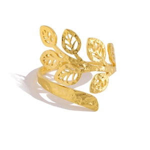 Macro detail of 18K gold-plated stainless steel ring with hollow leaf pattern