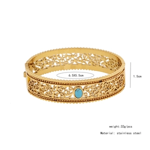Detail showing vintage gold hollow cuff bracelet with turquoise and size dimensions