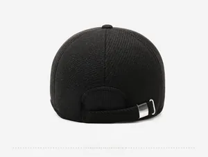 Rear view of black knitted baseball cap showing silver metal buckle and texture