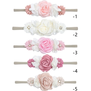Five styles of nylon baby headbands with colorful handmade cloth flowers and rhinestones
