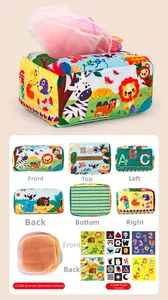 Detail of infant sensory tissue box toy with colorful scarves and crinkle squares