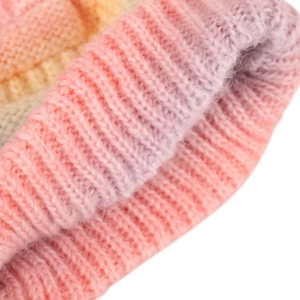 Women's winter knit beanie featuring a vibrant pink, purple and orange gradient pattern