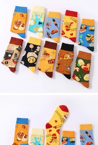 Close-up of colorful food illustration patterns on knitted cotton crew socks