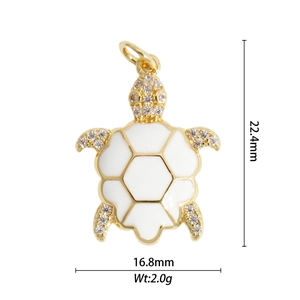 Detail of 18K gold turtle pendant with white enamel shell and zirconia, 22.4x16.8mm size