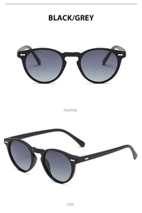 Front and side views of vintage round polarized sunglasses with black frames and grey lenses