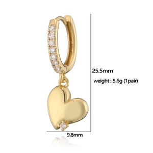 Detailed view of gold heart drop earrings with white zircon pavé and 25.5mm dimension